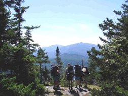 Hiking in the scenic Lakes Region of New Hampshire, the heart of the White Mountain National Forest.